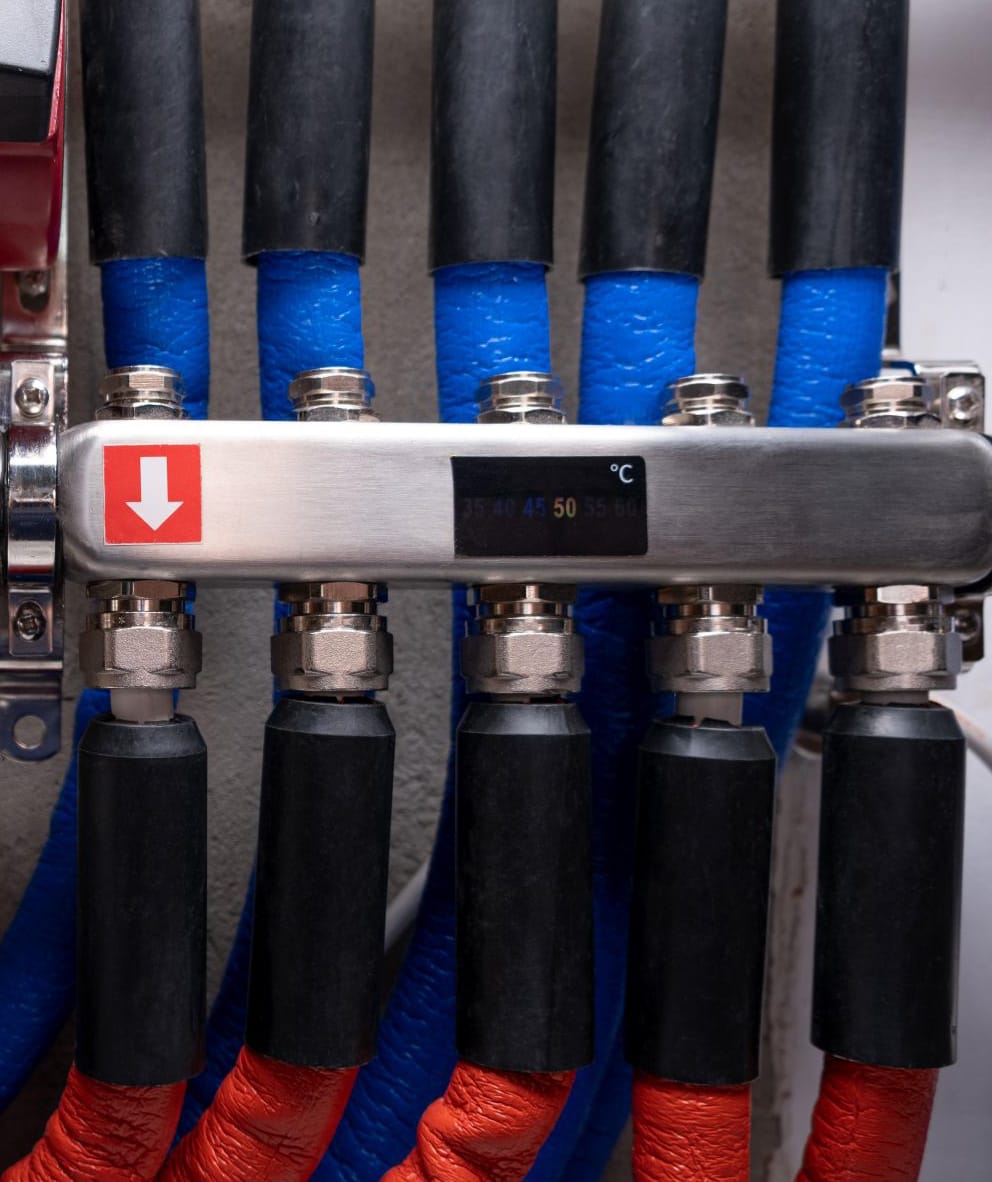 Hot and cold pipework from a communal heat network