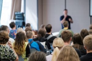 roup of people in a meeting representing an AGM for RMC and RTM directors